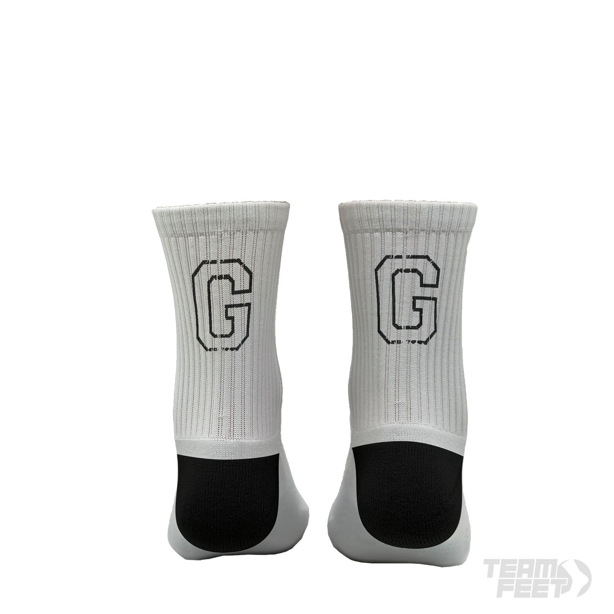 make a white sock with a big black G on the back of sock and have grip underneath it - Mid